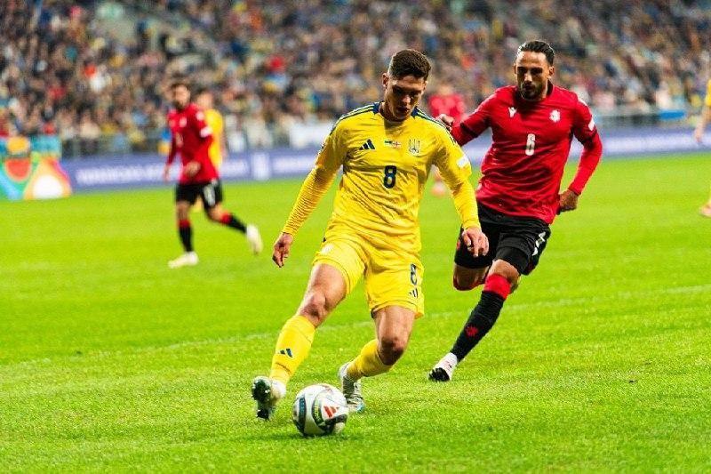 Україна